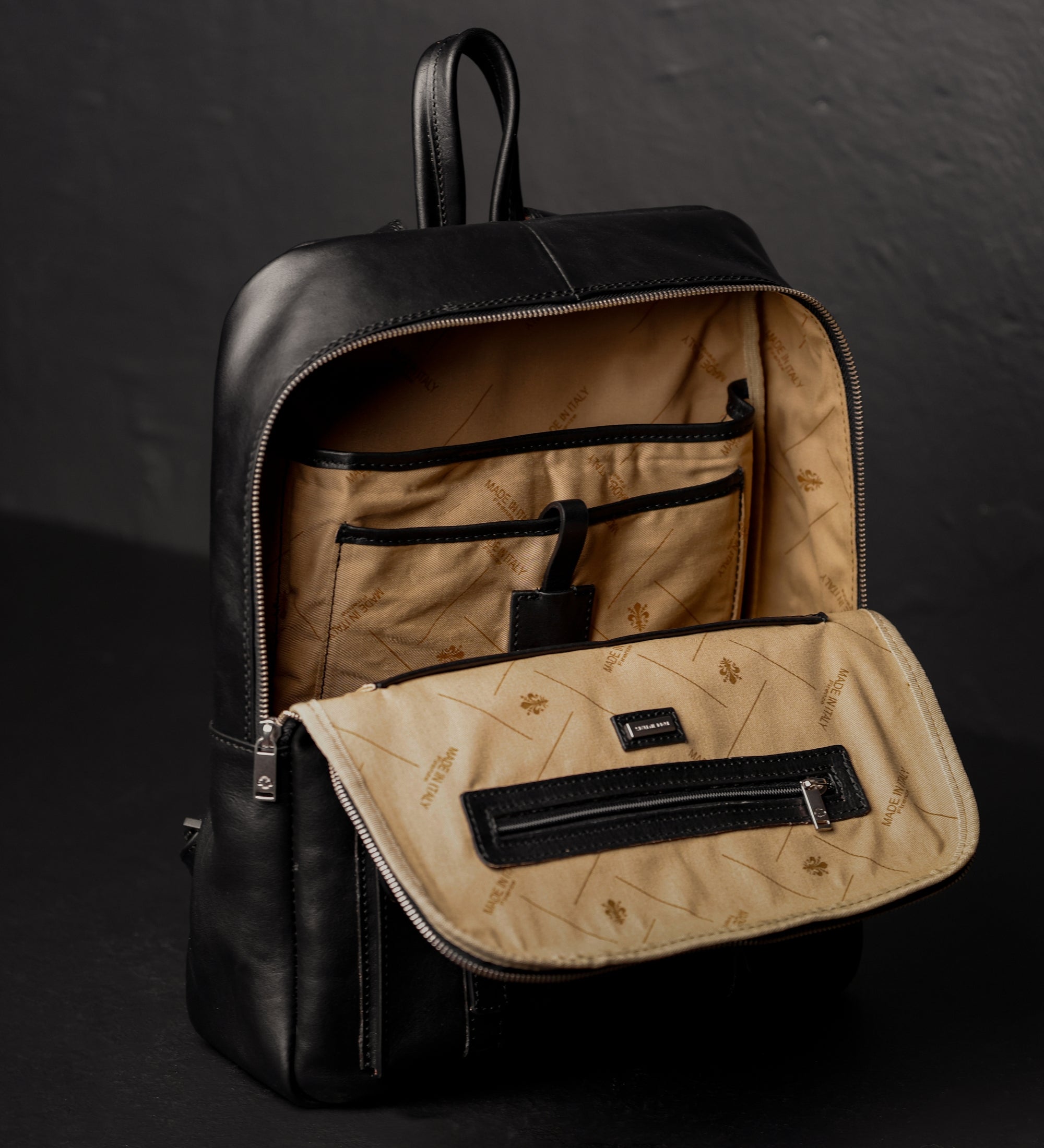 Ryggsäck i läder resväska i läder för dam – The Divine Comedy